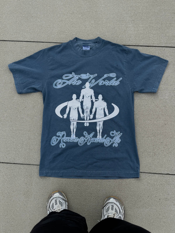THE WORLD REVOLVES AROUND ME TEE